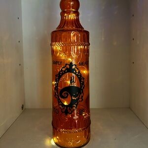 Jack and Sally Lighted Wine bottle. Clear colored lights with cork